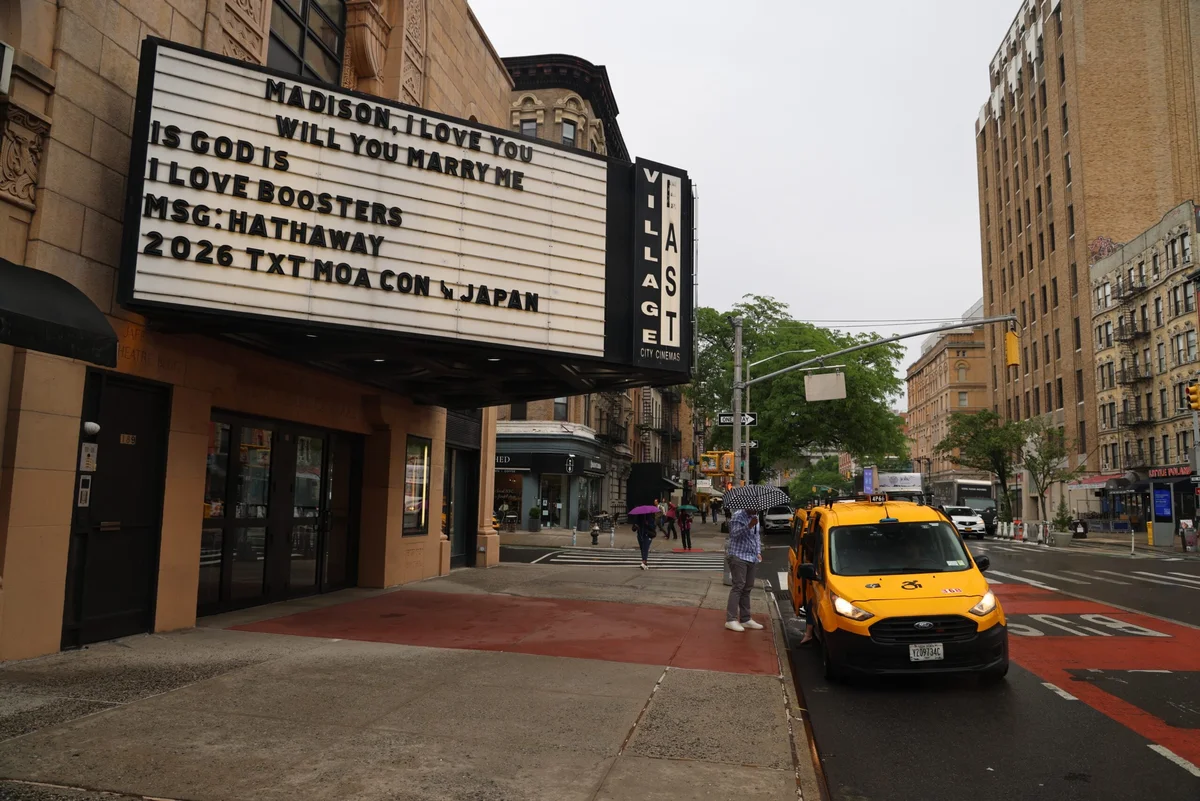 Village East cinema marquee on a rainy Manhattan street
